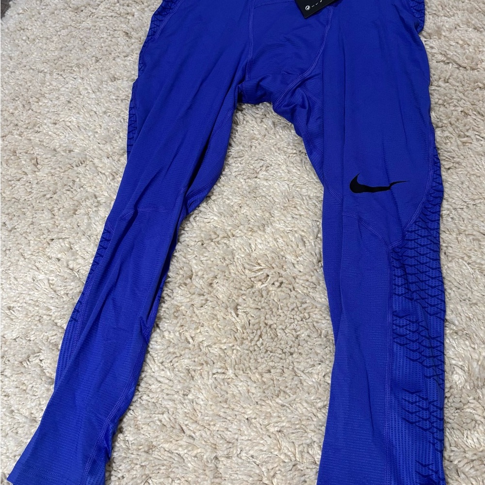 Nike men’s  Blue Athletic compression Bottoms size medium